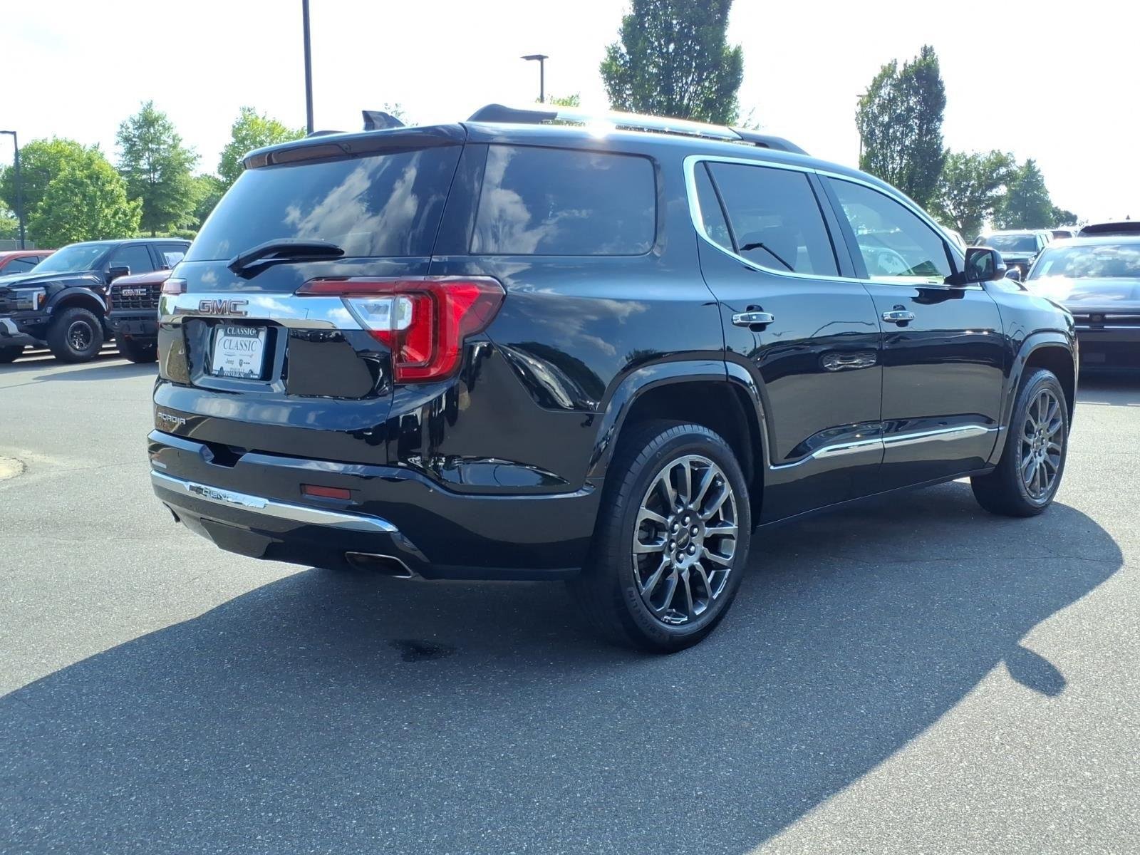 Used 2023 Ebony Twilight Metallic GMC Denali image 2