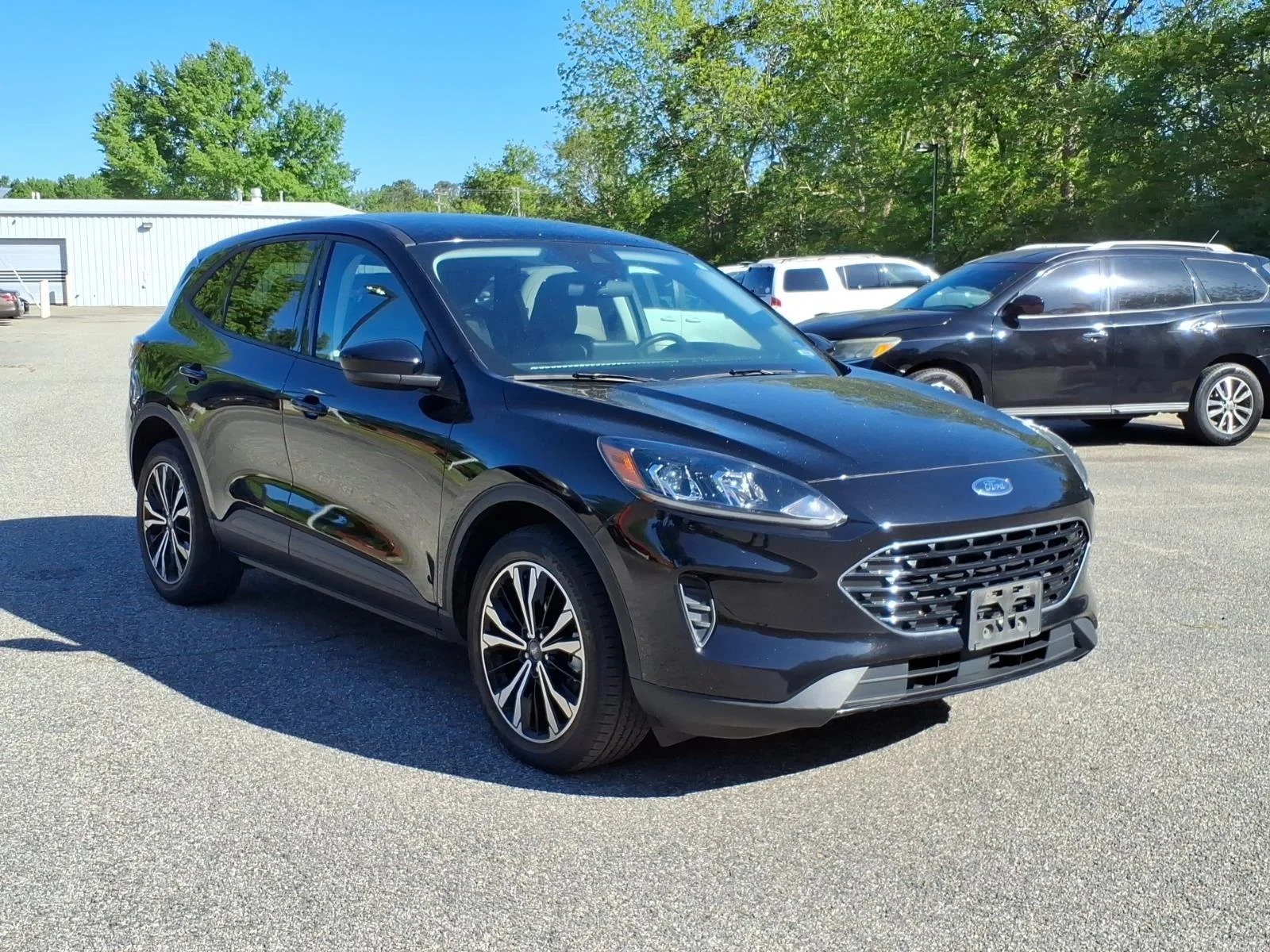 Used 2021 Agate Black Metallic Ford SE Hybrid image 5