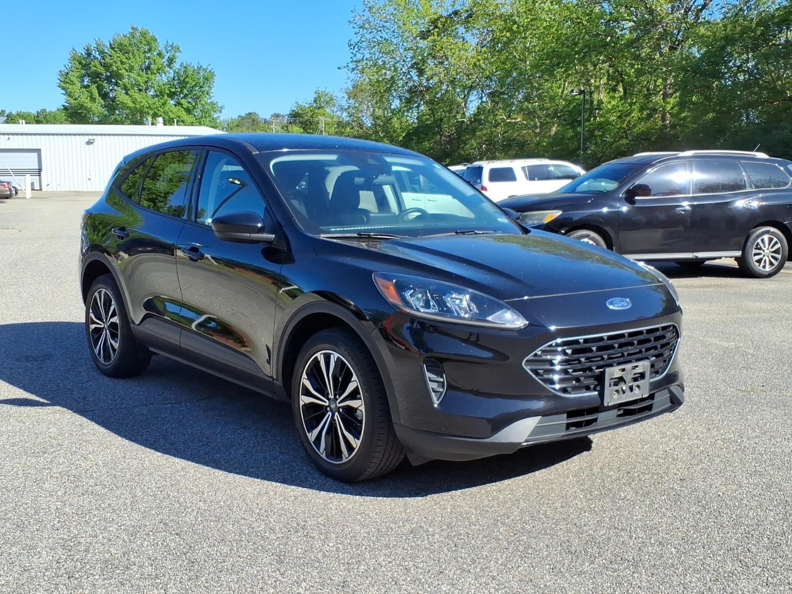 Used 2021 Agate Black Metallic Ford SE Hybrid image 5