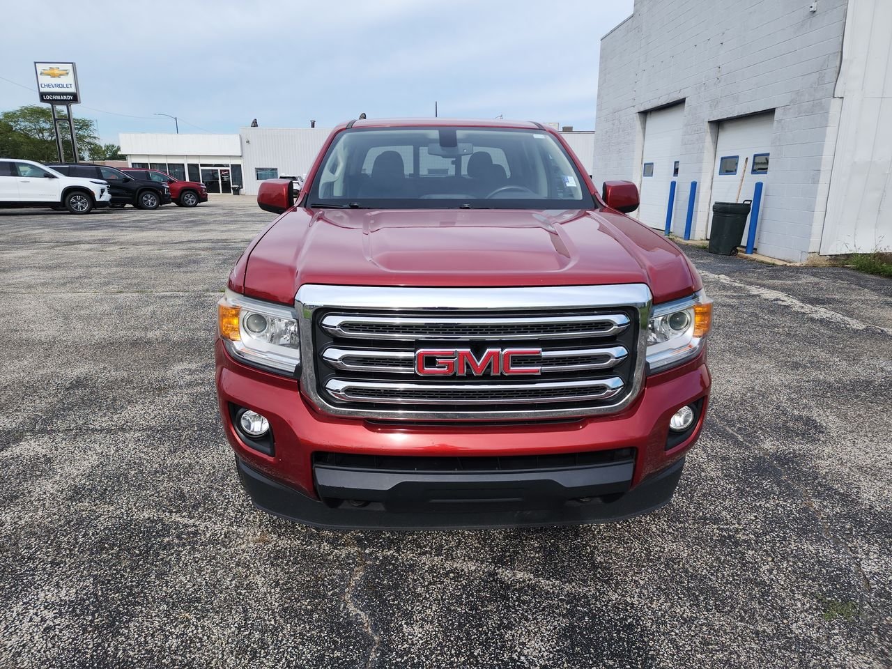 Used 2016 COPPER RED METALLIC GMC 4WD SLE image 3