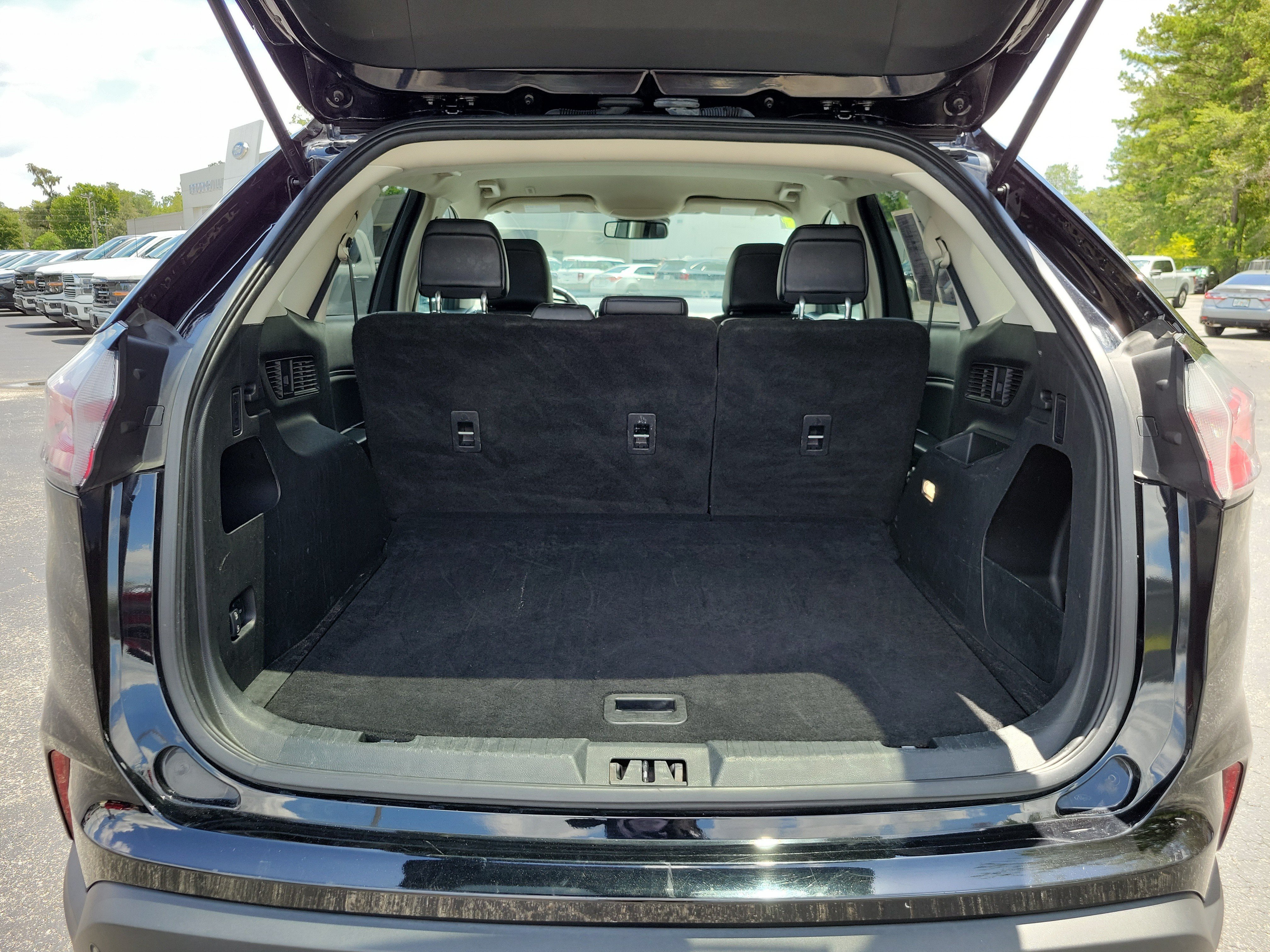 Used 2024 Agate Black Metallic Ford SEL image 22