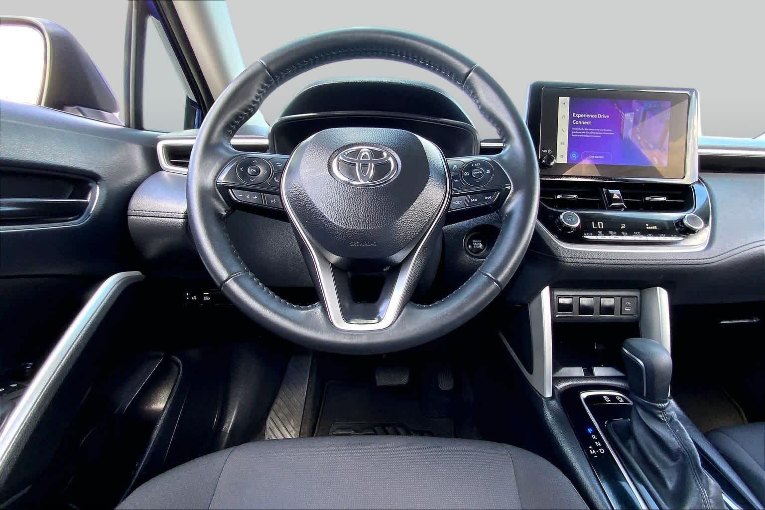 Certified Used 2024 Blue Crush Metallic Toyota LE image 6
