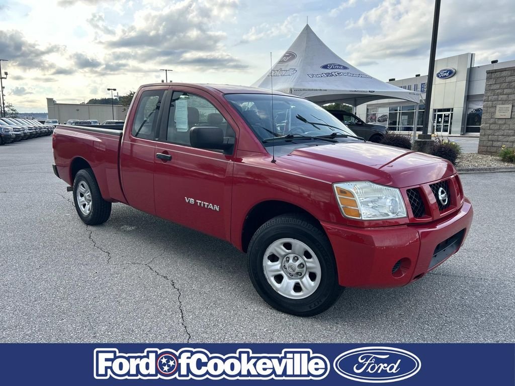 Used 2006 Red Alert Nissan XE image 1
