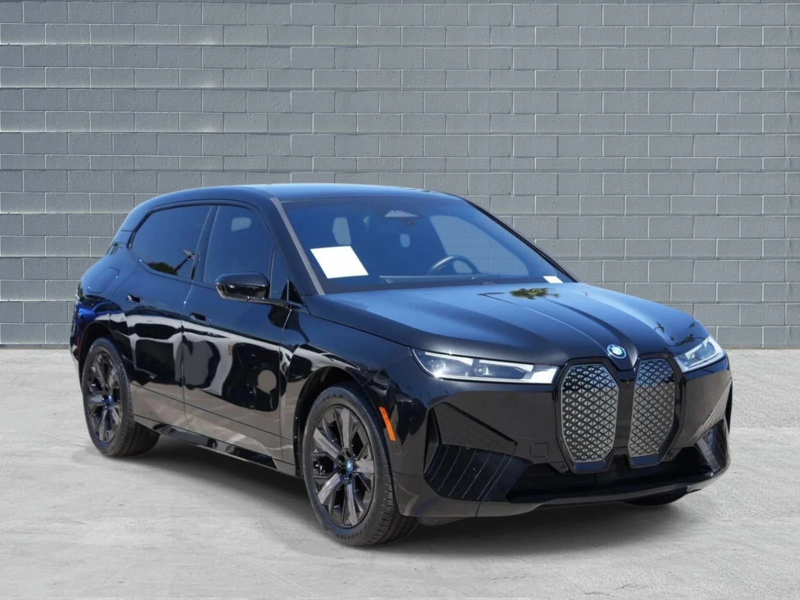 Used 2024 Black Sapphire Metallic BMW xDrive50 Sports Activity Vehicle image 1