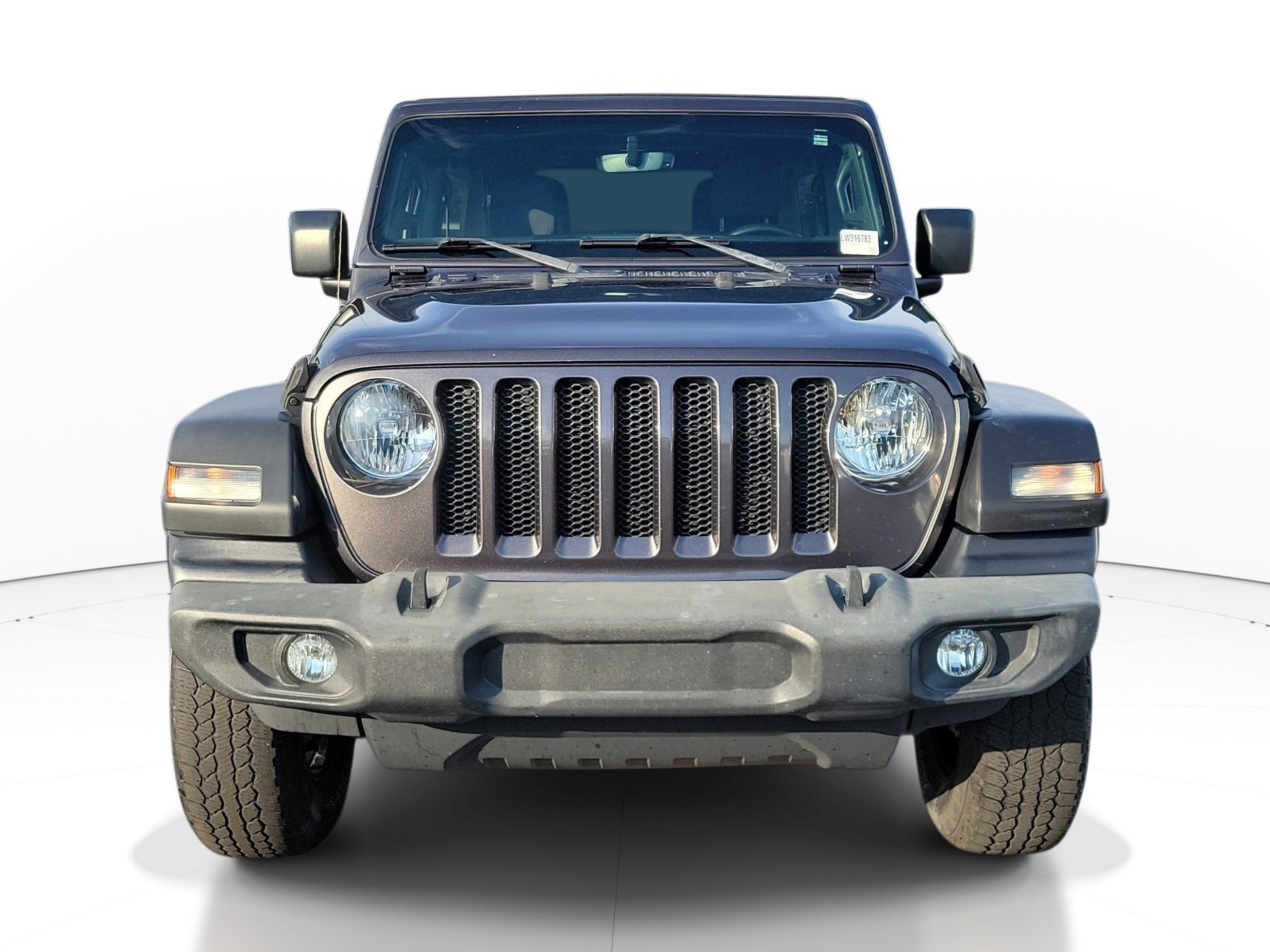 Used 2020 Granite Crystal Metallic Clearcoat Jeep Sport S image 1