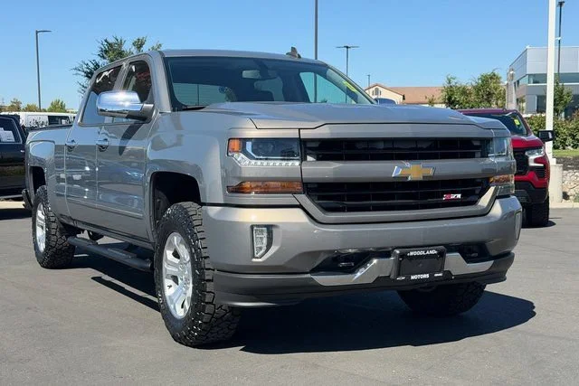 Used 2017 PEPPERDUST METALLIC Chevrolet LT image 1