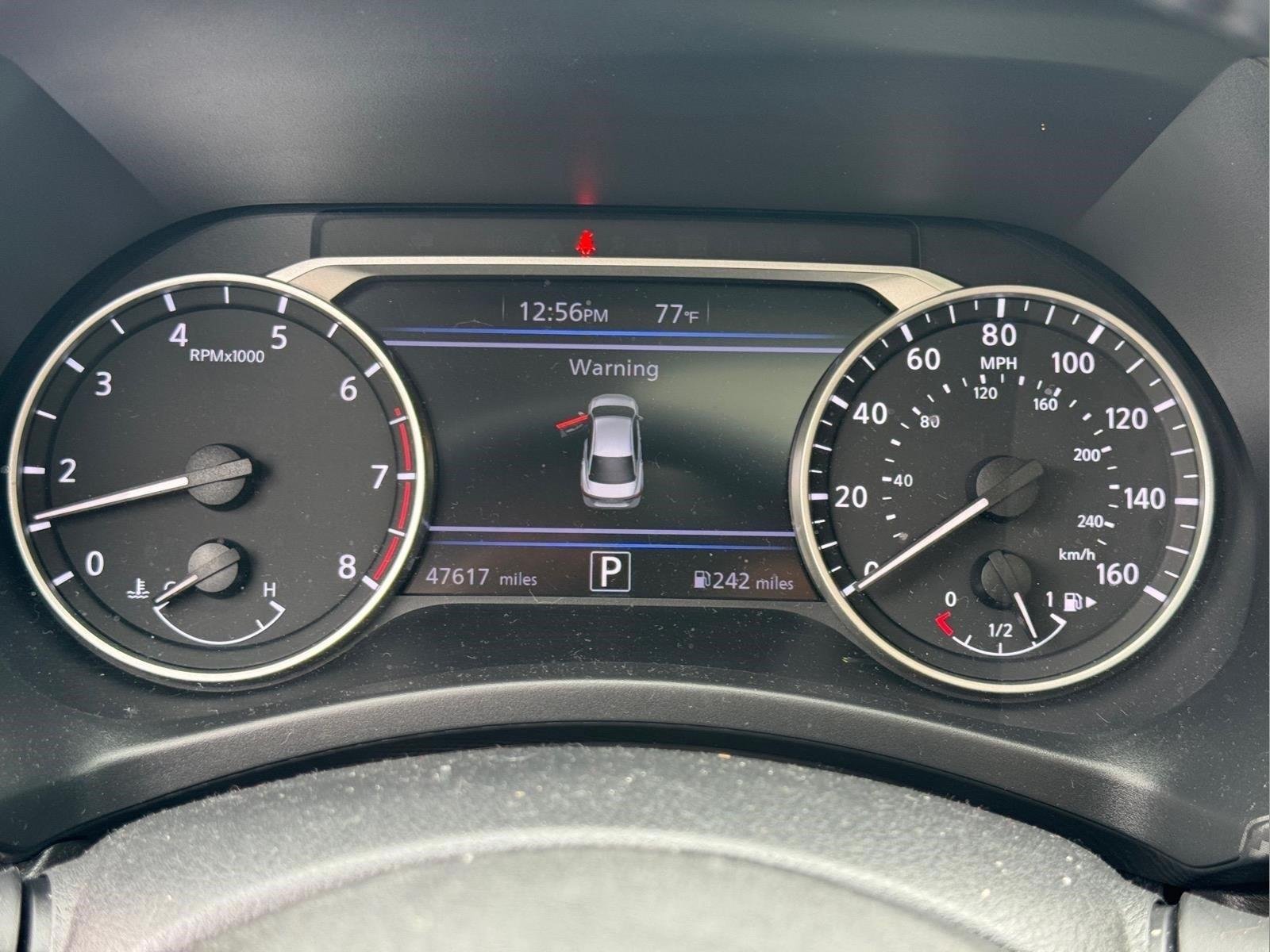 Used 2021 Electric Blue Metallic Nissan SV image 22