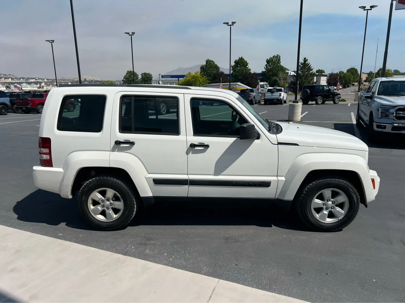 Used 2010 Stone White Clearcoat Jeep Sport image 6