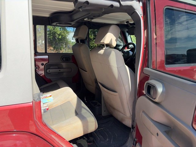 Used 2010 Red Jeep Unlimited Sahara image 15