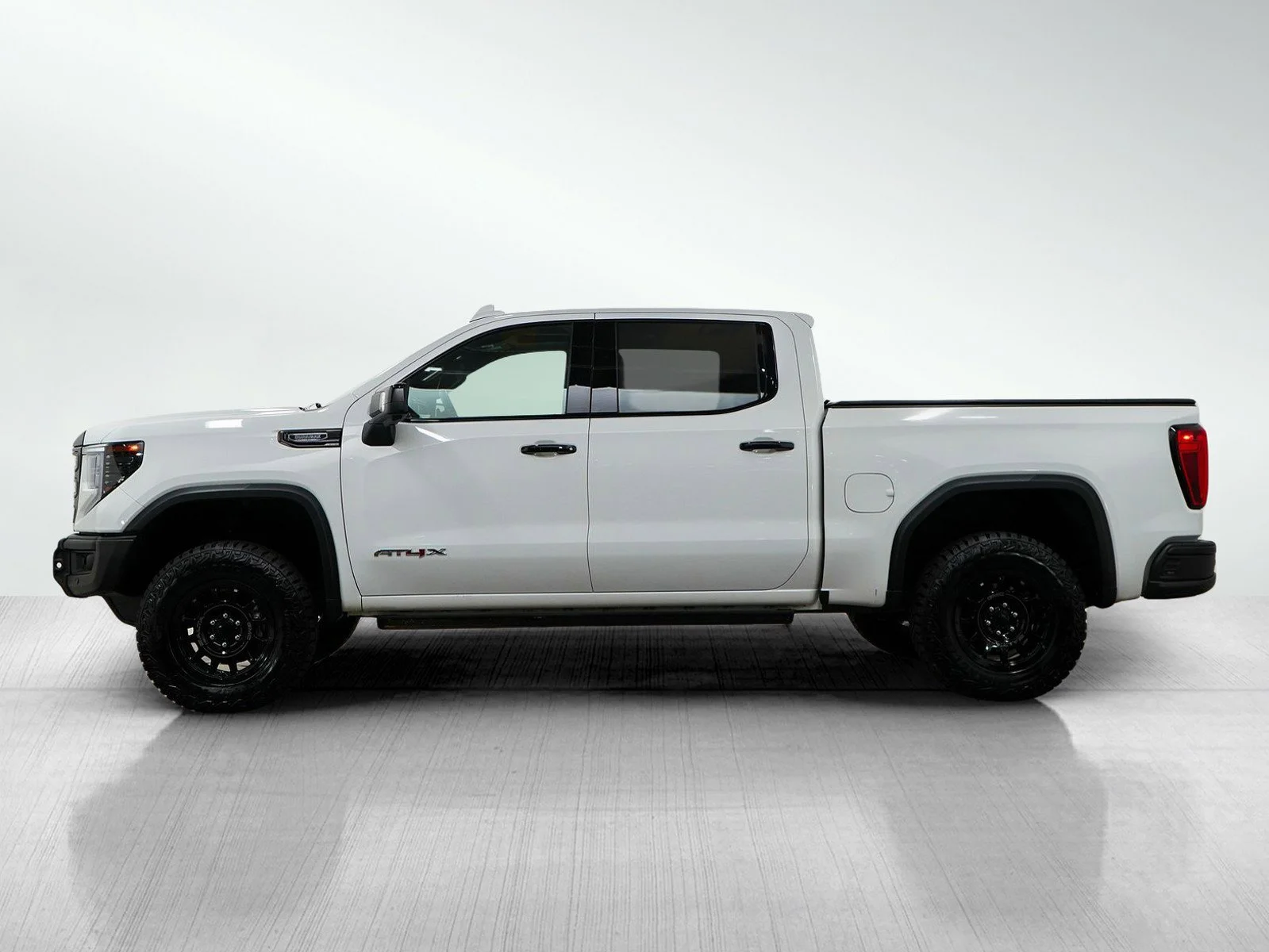 Used 2024 GMC Sierra 1500 AT4X with VIN 3GTUUFE86RG180245 for sale in Roseville, Minnesota