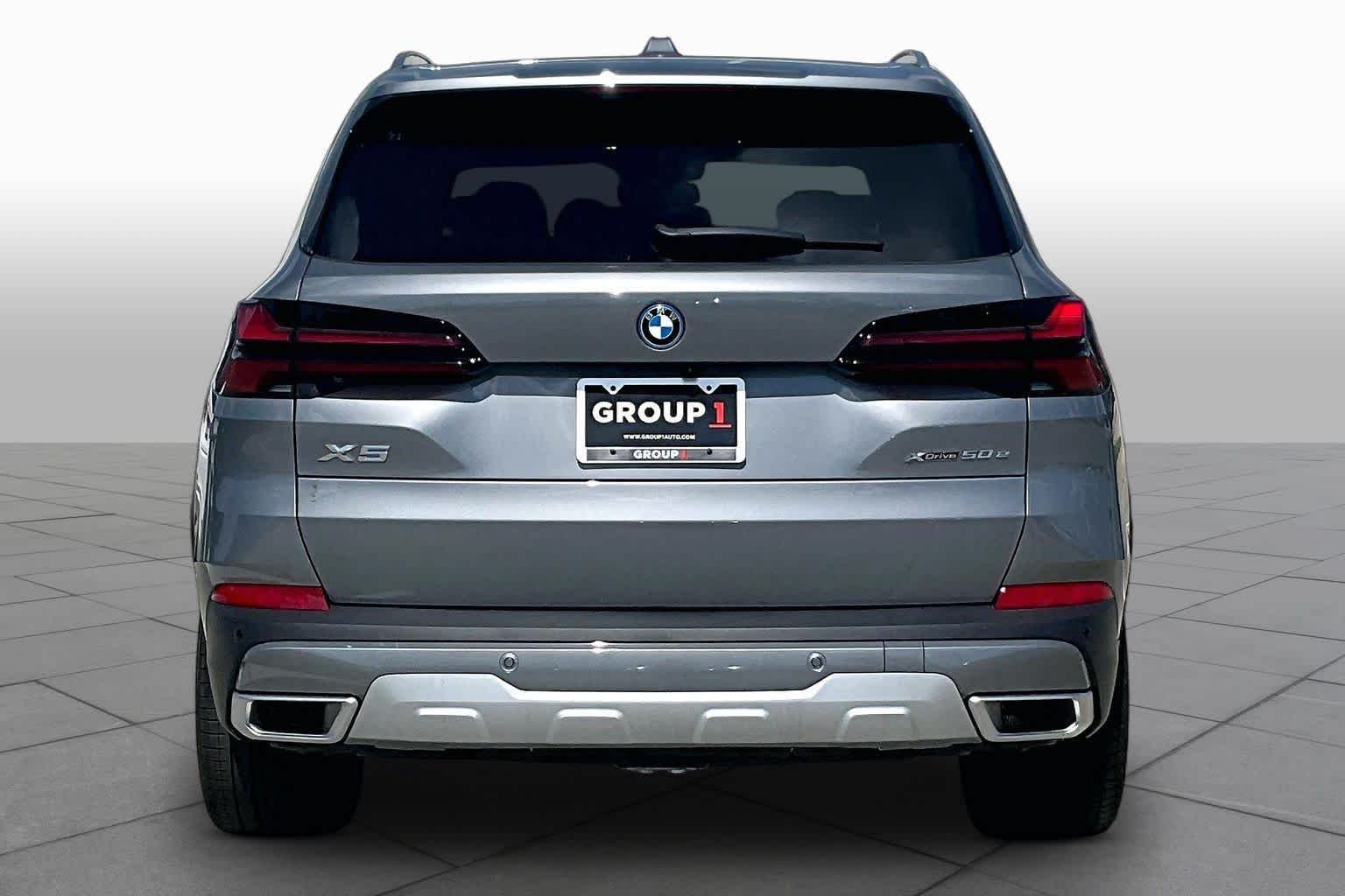 Used 2026 Skyscraper Grey Metallic BMW xDrive50e image 4