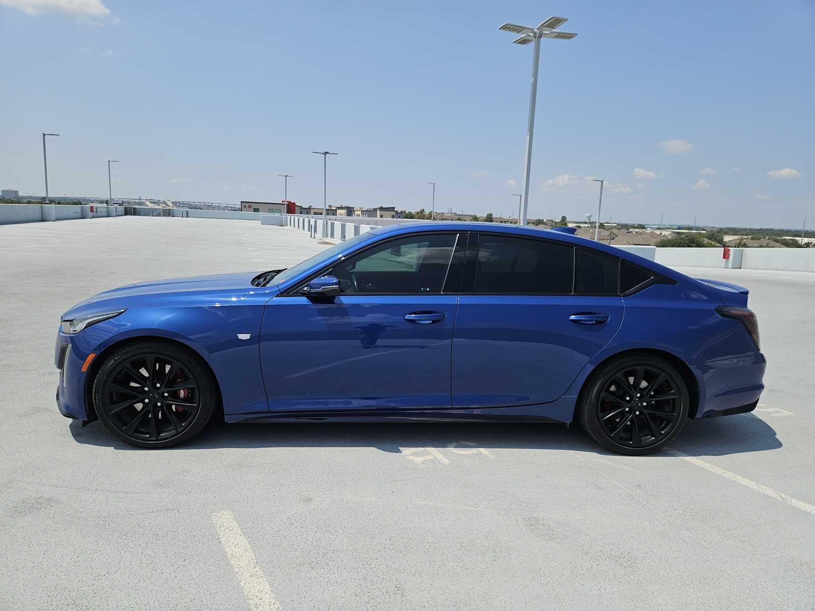 Used 2021 Wave Metallic Cadillac Sport image 4