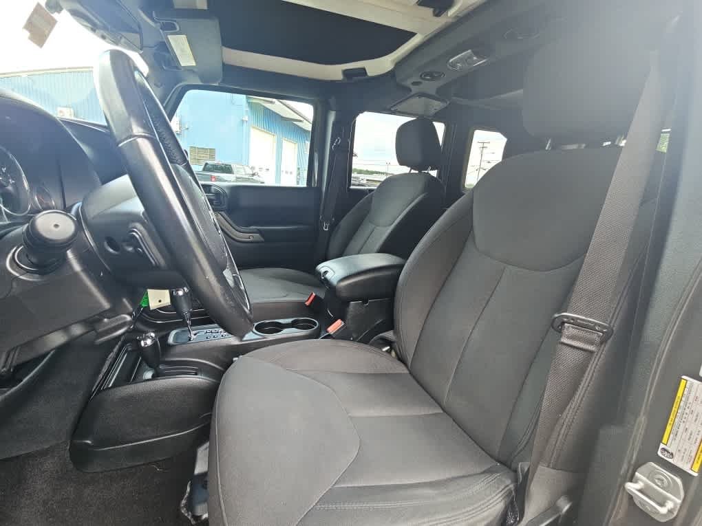 Used 2018 Granite Crystal Metallic Clearcoat Jeep Sport S image 11
