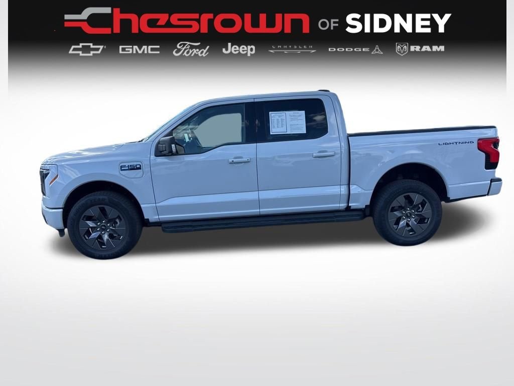 Used 2025 Ford F-150 Lightning Flash with VIN 1FT6W3LU6SWG07156 for sale in Sidney, OH