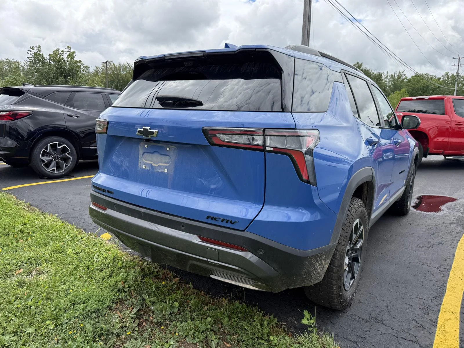 Used 2025 Reef Blue Metallic Chevrolet AWD ACTIV image 6