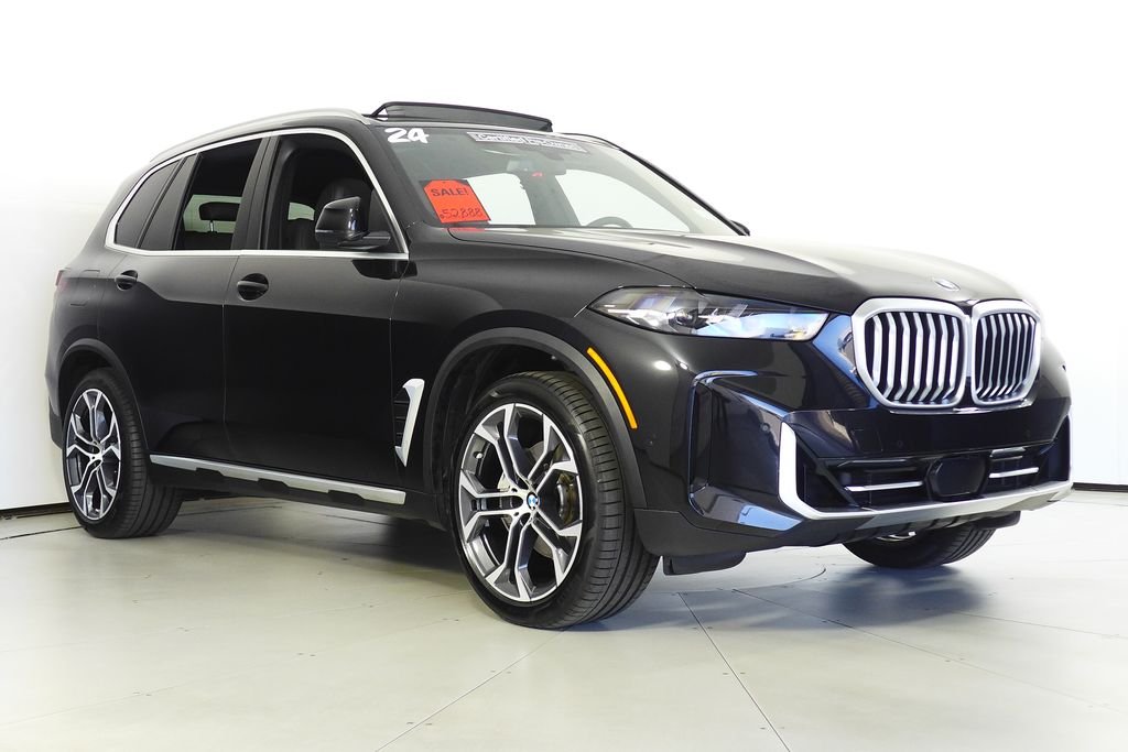 Certified Used 2024 Black Sapphire Metallic BMW sDrive40i image 4