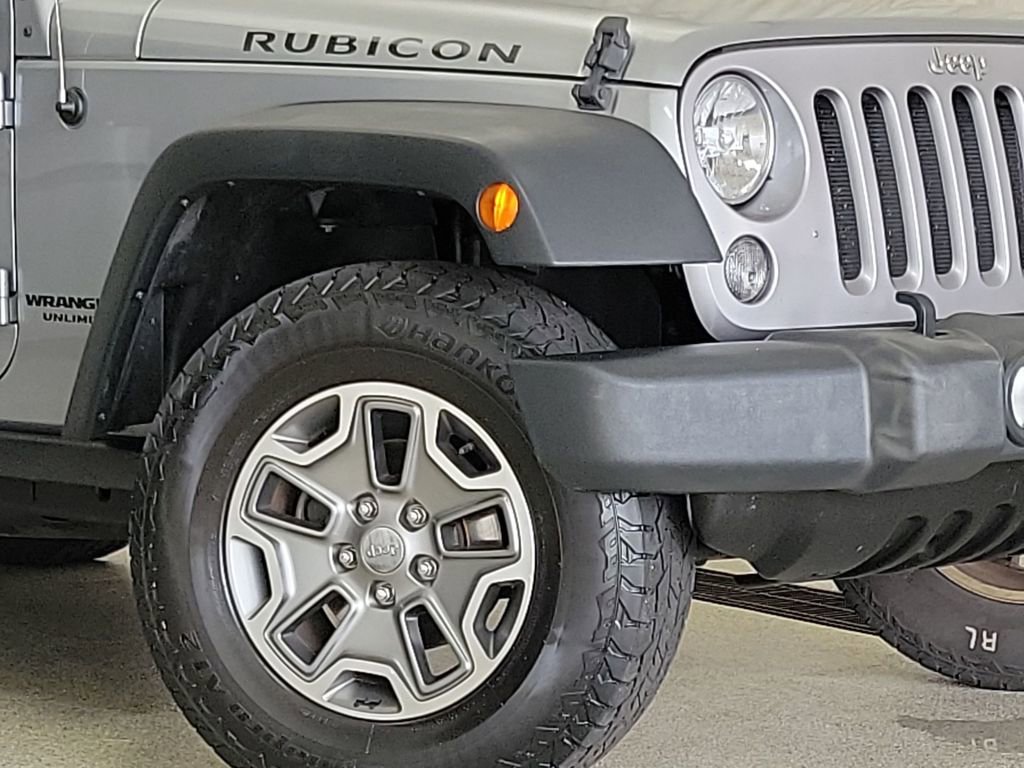 Used 2014 Jeep Wrangler Unlimited Rubicon with VIN 1C4BJWFG5EL160426 for sale in Sandwich, IL