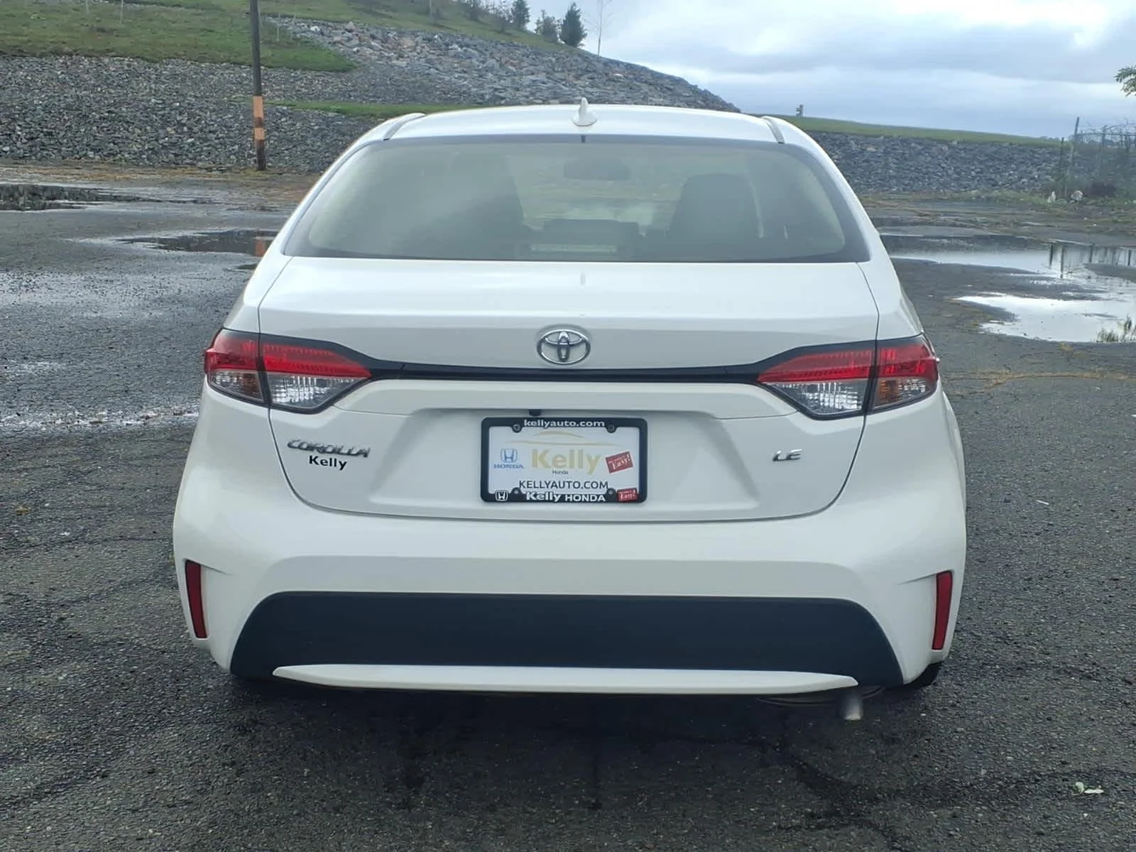 Used 2021 Super White Toyota LE image 6