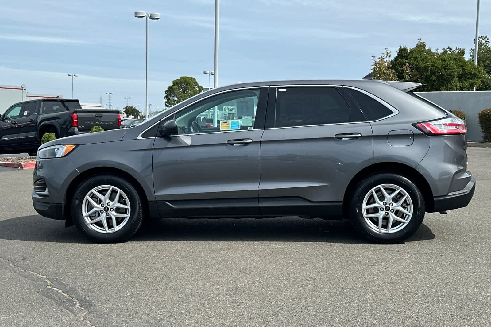 Used 2024 Carbonized Gray Metallic Ford SEL image 9