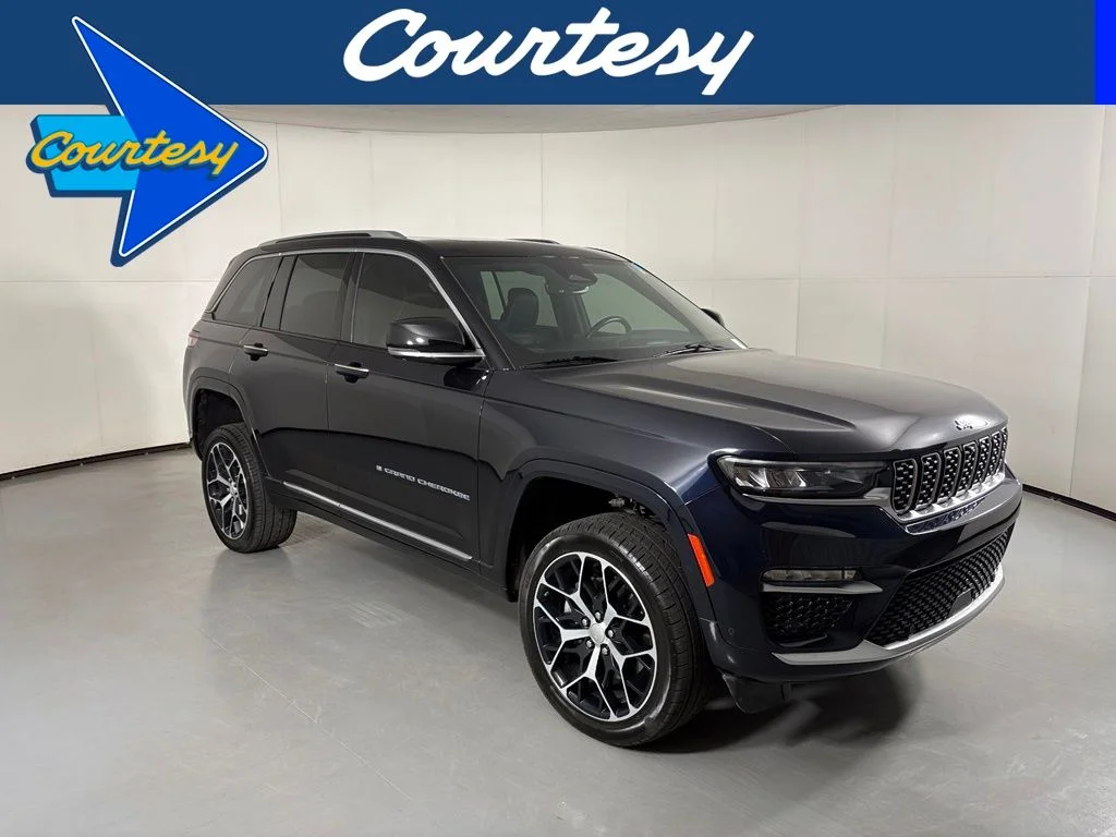 Used 2023 Black Jeep Summit Reserve 4xe image 1