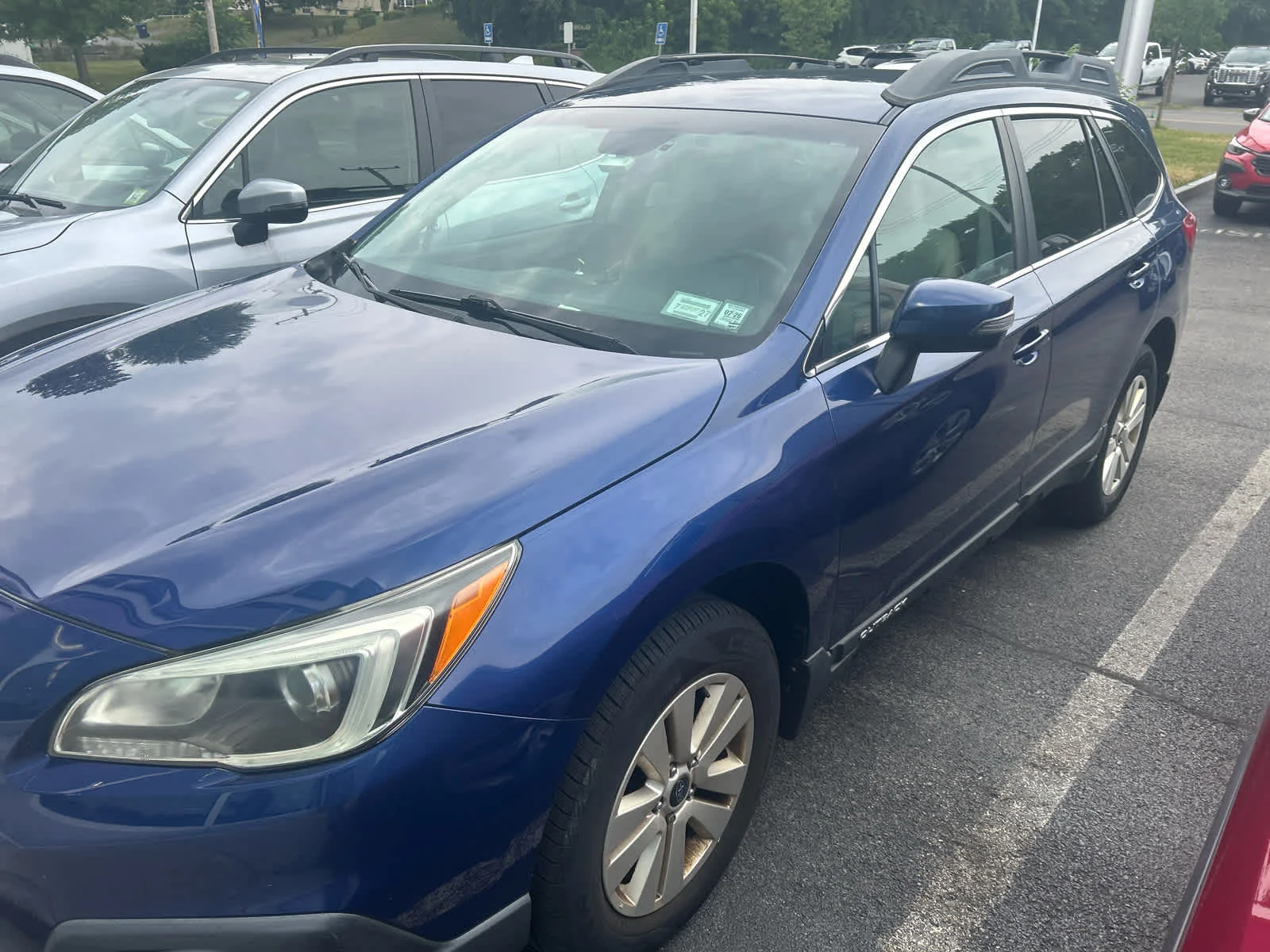 Used 2015 Lapis Blue Pearl Subaru 2.5i Premium image 1