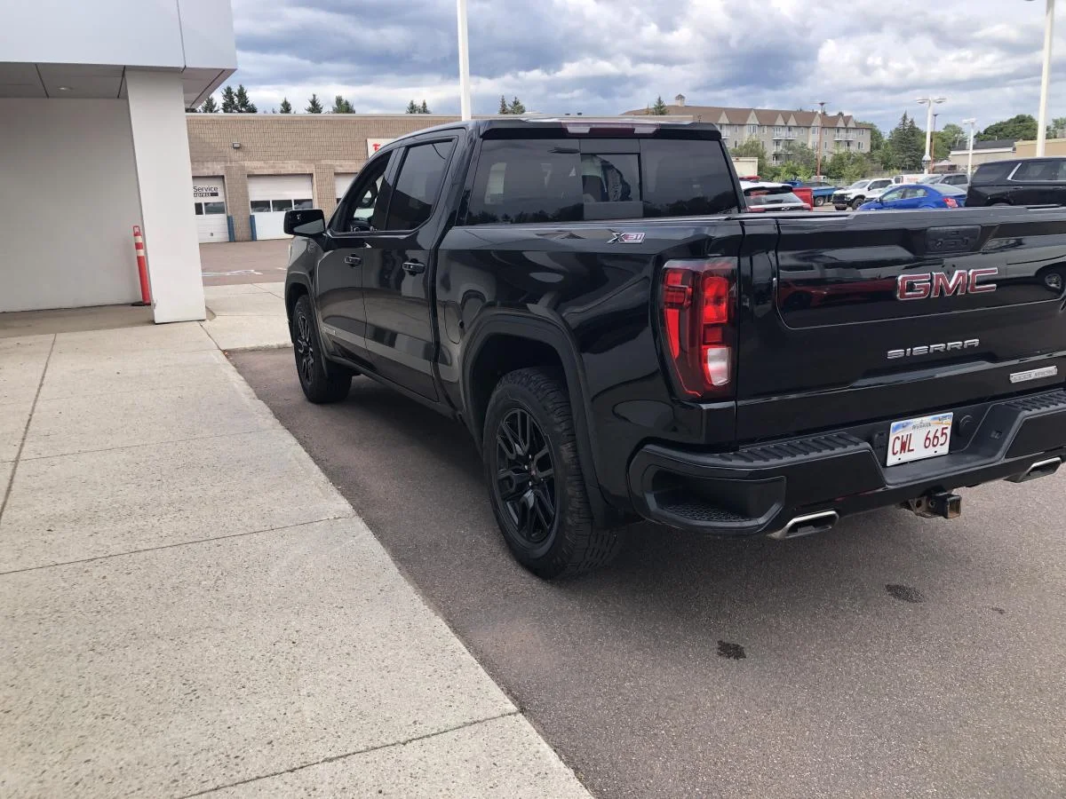 Used 2021 Black GMC 4WD Crew Cab 147" Elevation image 6