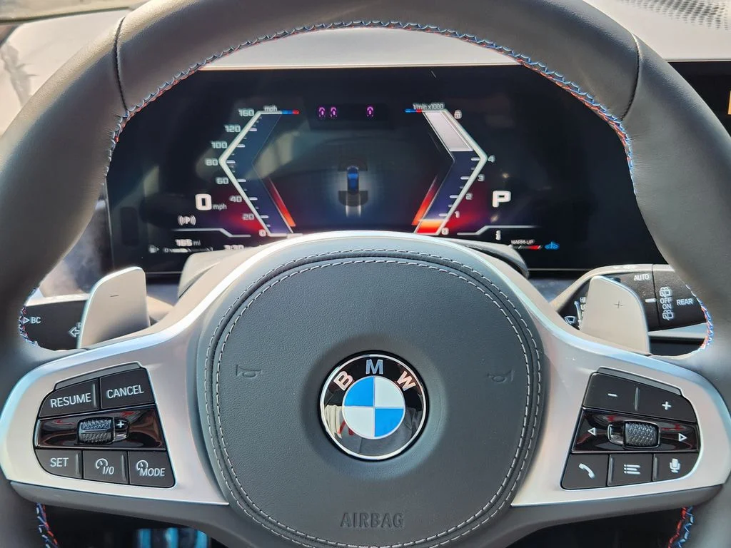 New 2026 Black Sapphire Metallic BMW M60i image 12
