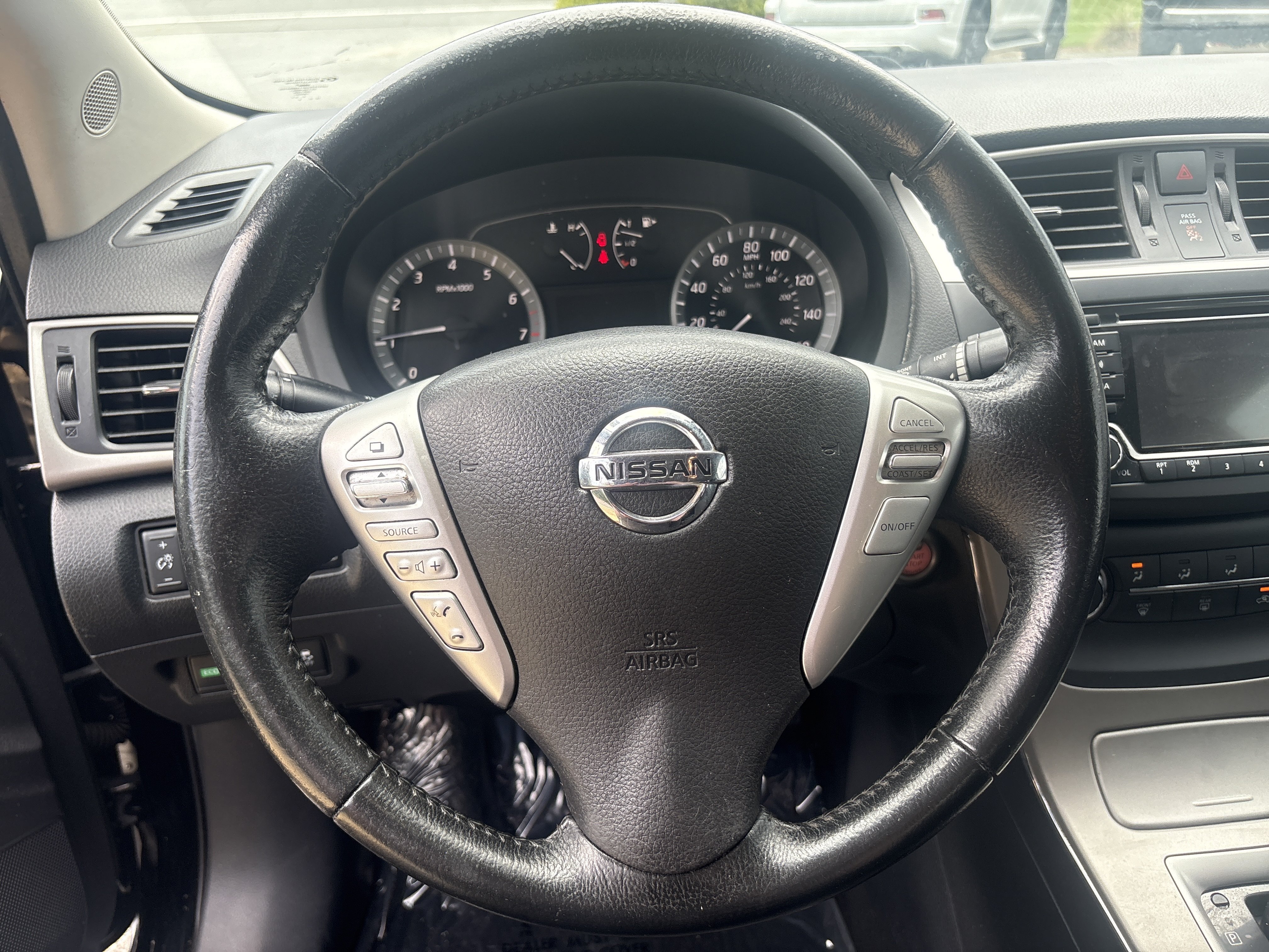 Used 2015 Super Black Nissan SV image 17