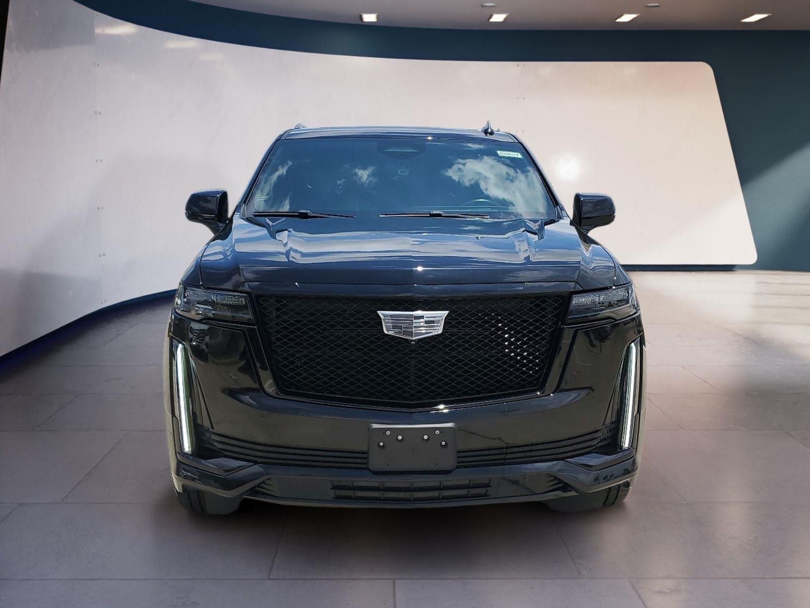 Used 2024 Black Raven Cadillac 4WD Sport image 8