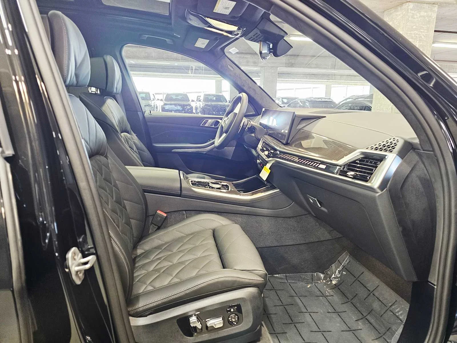 New 2026 Black Sapphire Metallic BMW M60i image 27