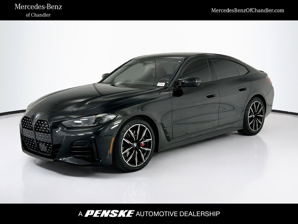 Used 2024 Black Sapphire Metallic BMW M440i xDrive Gran Coupe image 1