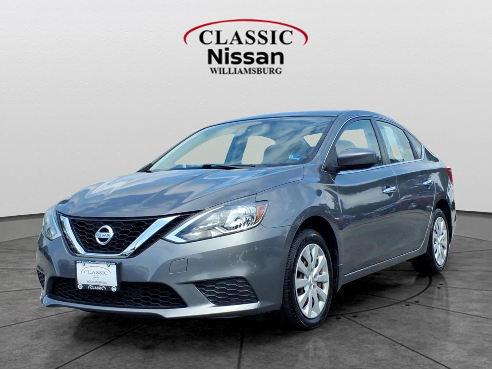 Used 2019 Gun Metallic Nissan S image 1