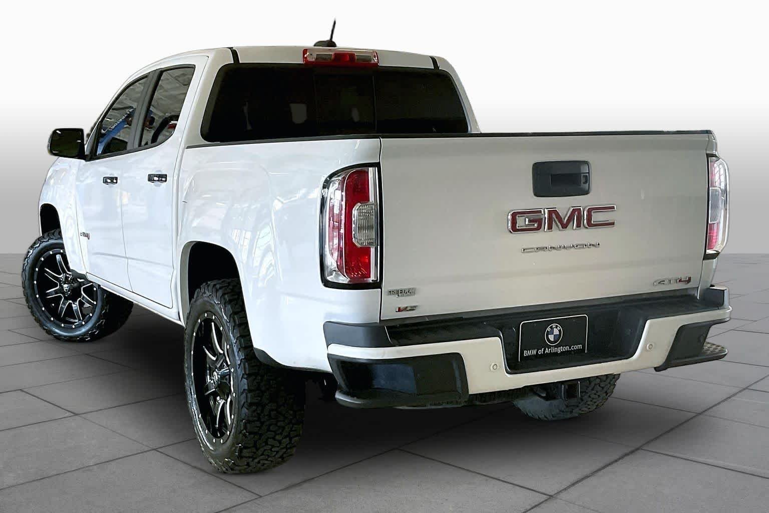Used 2021 Summit White GMC 4WD AT4 w/Leather image 11
