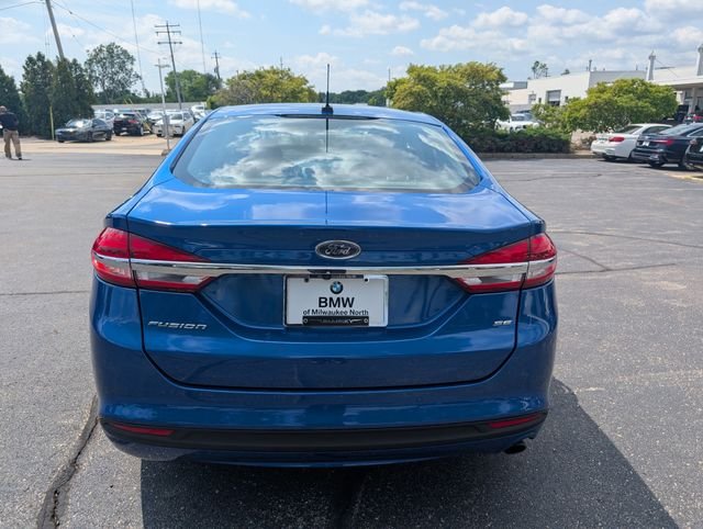Used 2017 Lightning Blue Ford SE image 3