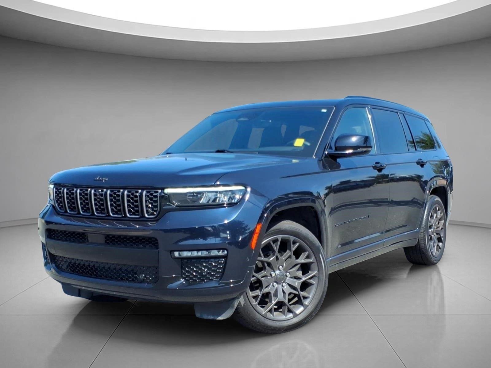 Used 2024 Diamond Black Crystal Pearlcoat Jeep Summit Reserve image 1