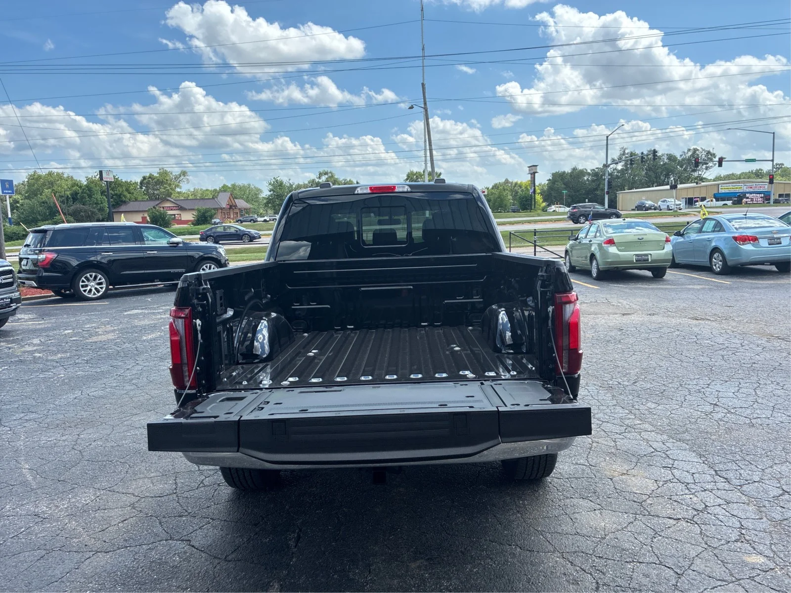 New 2026 Agate Black Metallic Ford Lariat® image 11
