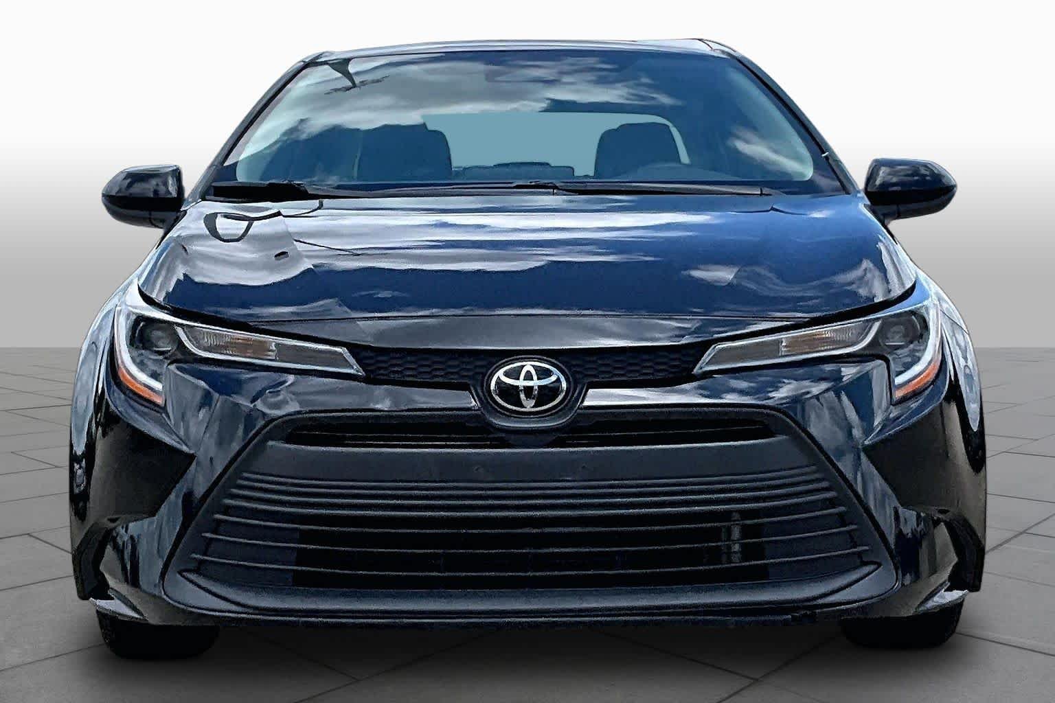 Used 2024 Midnight Black Metallic Toyota LE image 4
