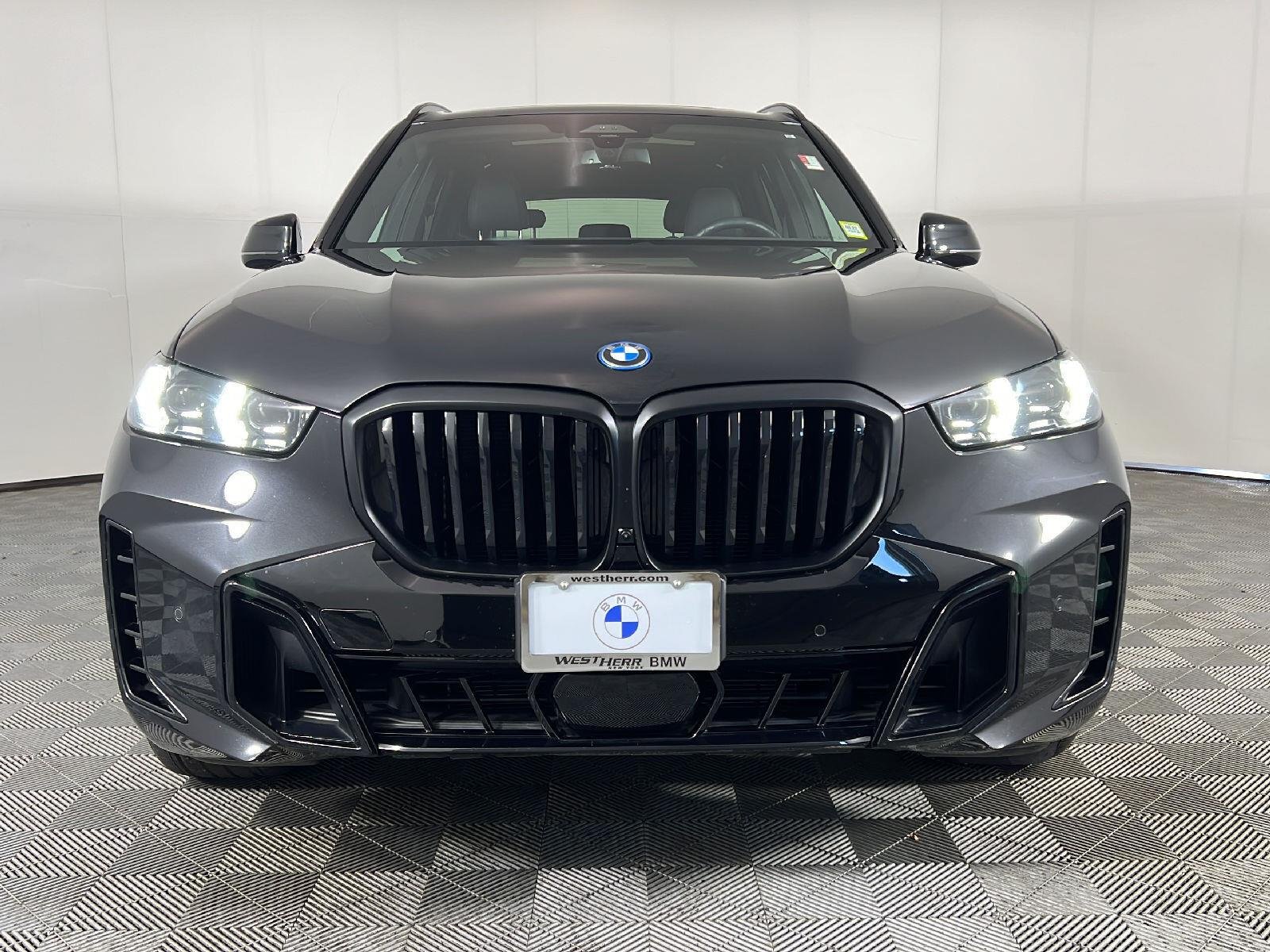 New 2026 Black Sapphire Metallic BMW xDrive50e image 7