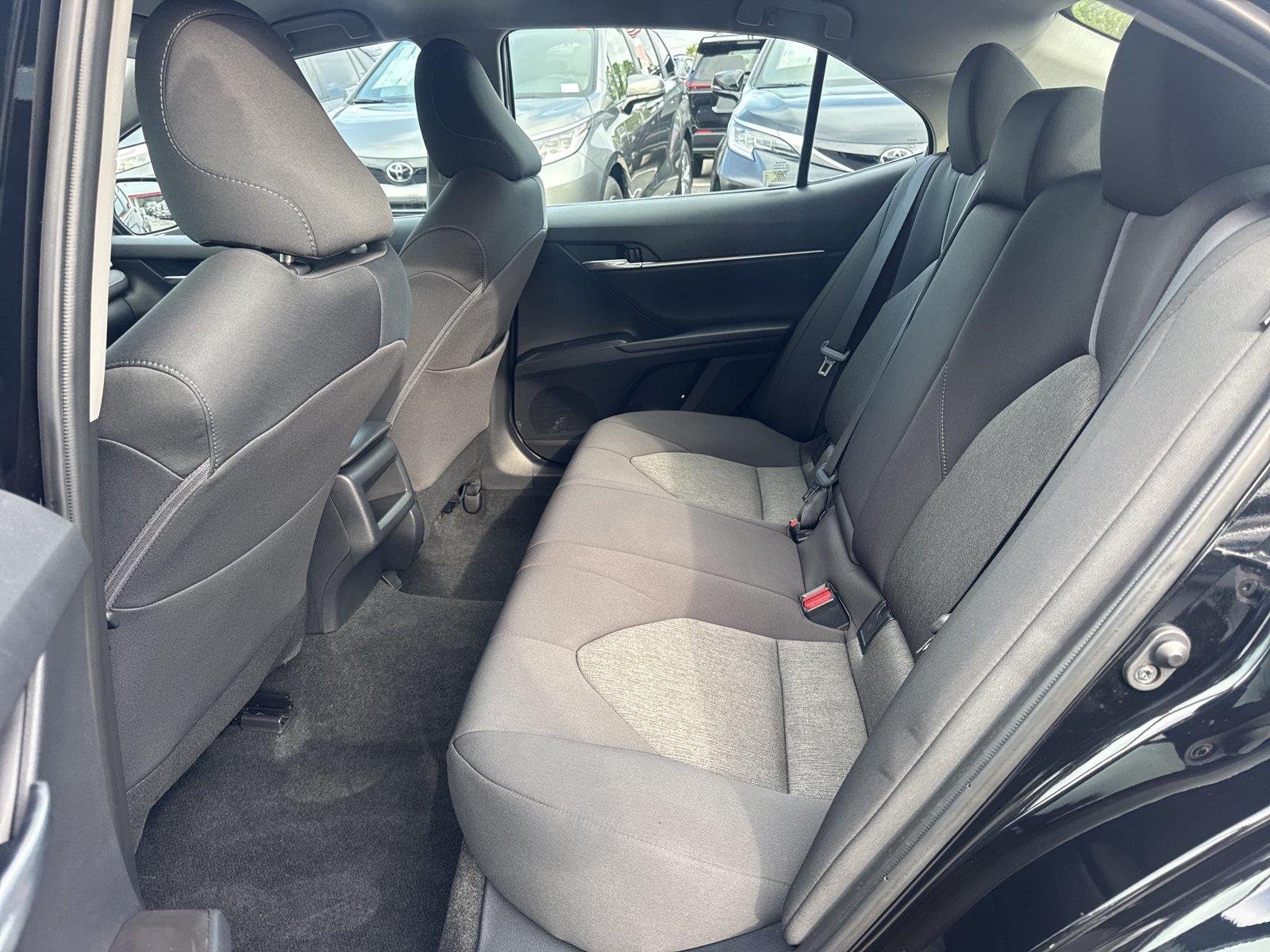 Used 2024 Midnight Black Metallic Toyota LE image 19
