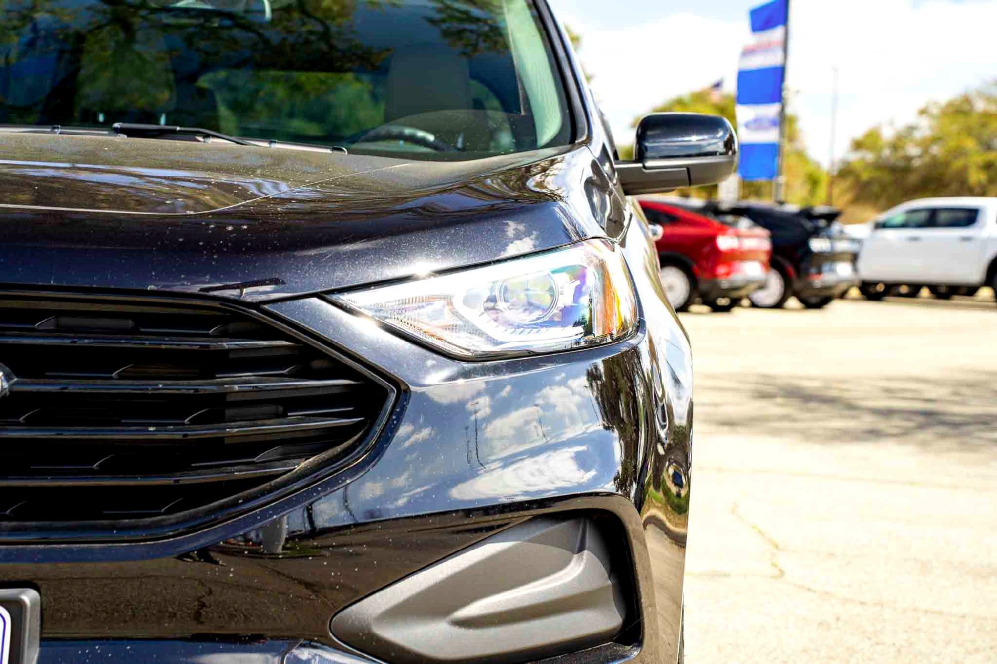 New 2024 Agate Black Metallic Ford SE image 9