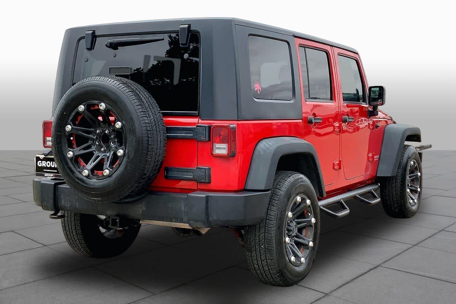 Used 2010 Flame Red Jeep Rubicon image 12