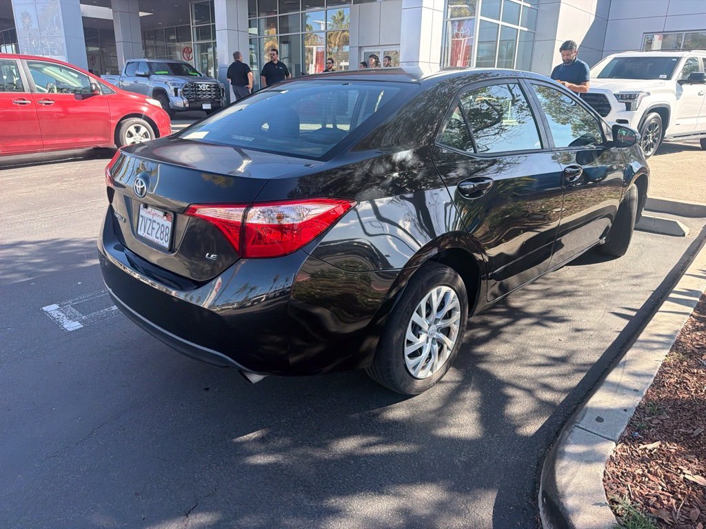 Used 2017 Black Sand Pearl Toyota LE image 4