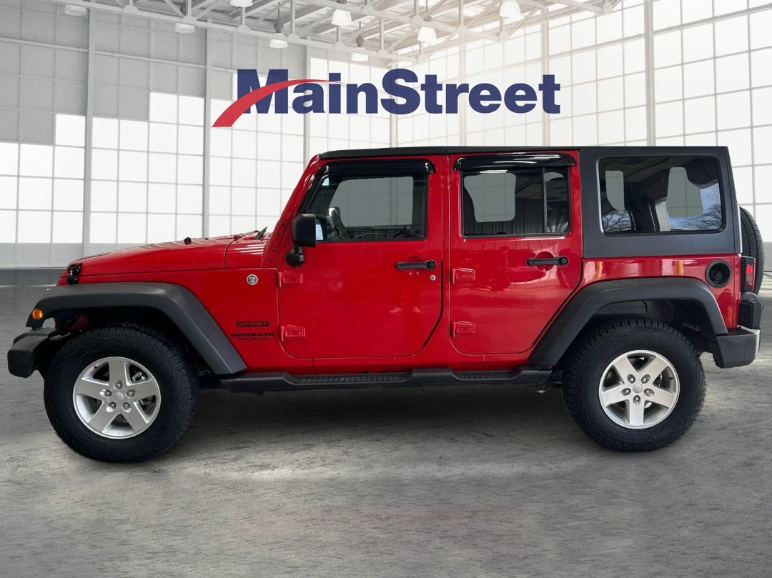 Used 2014 Jeep Wrangler Unlimited Sport with VIN 1C4BJWDG3EL155499 for sale in Lansing, KS