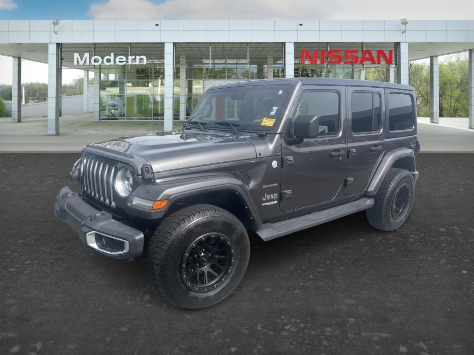 Used 2021 Granite Crystal Metallic Clearcoat Jeep Unlimited Sahara image 1