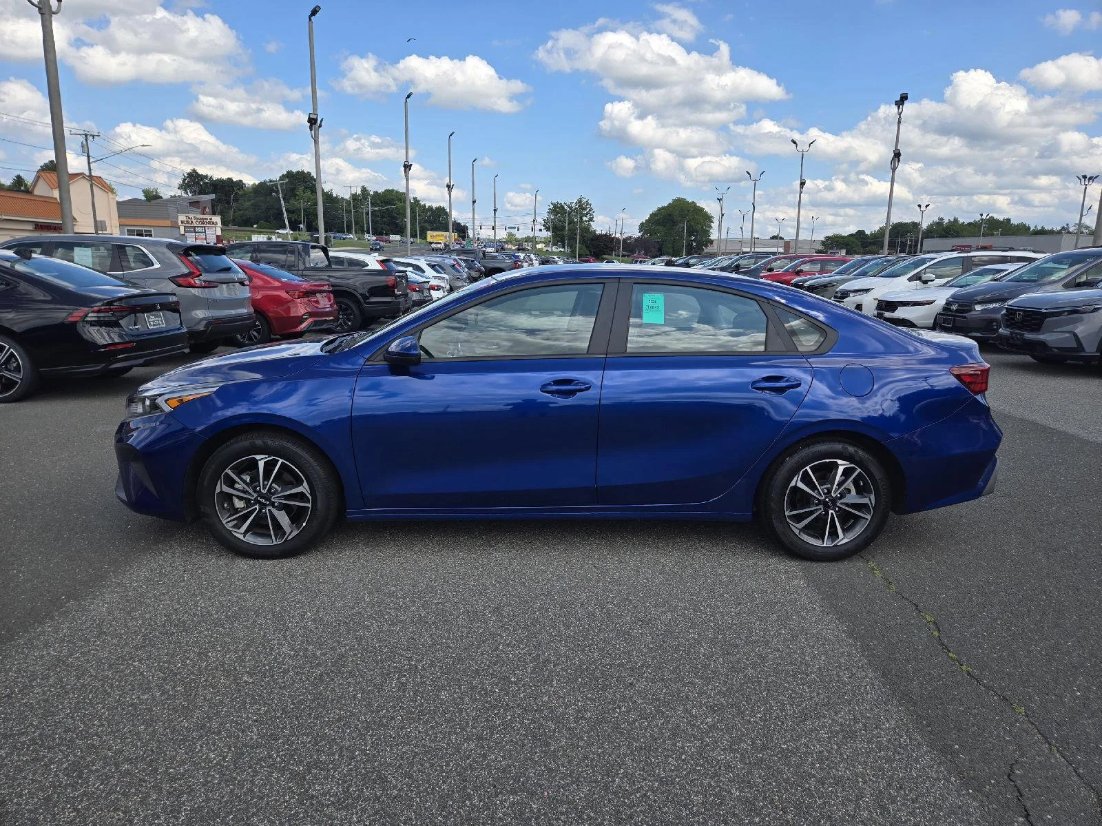Used 2024 Deep Sea Blue Kia LXS image 3