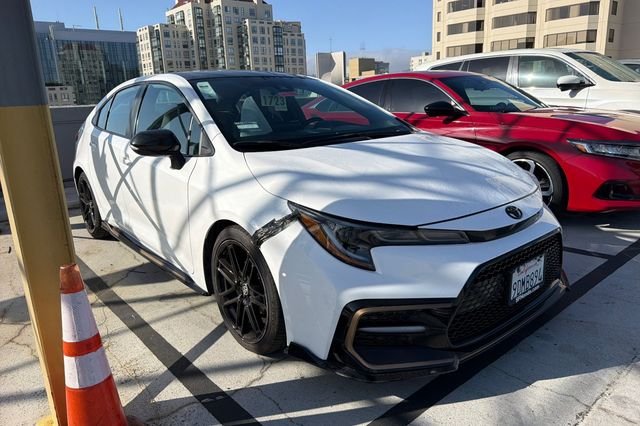 Used 2022 White w/Black Sand Pearl Roof Toyota APEX SE image 2