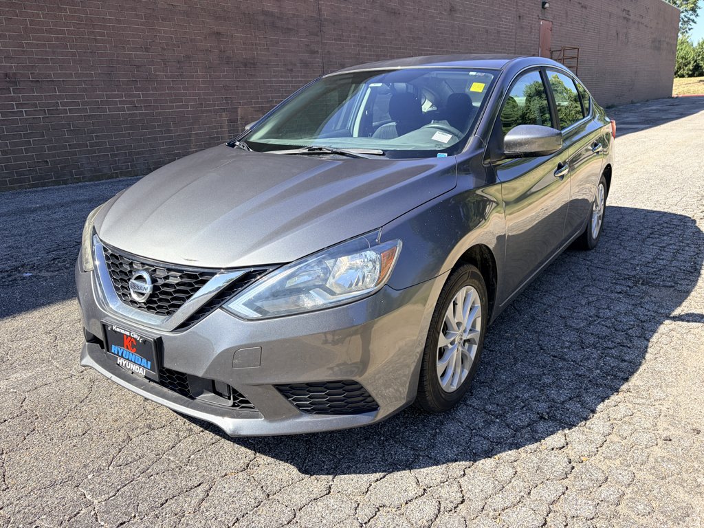 Used 2018 Gun Metallic Nissan SV image 1