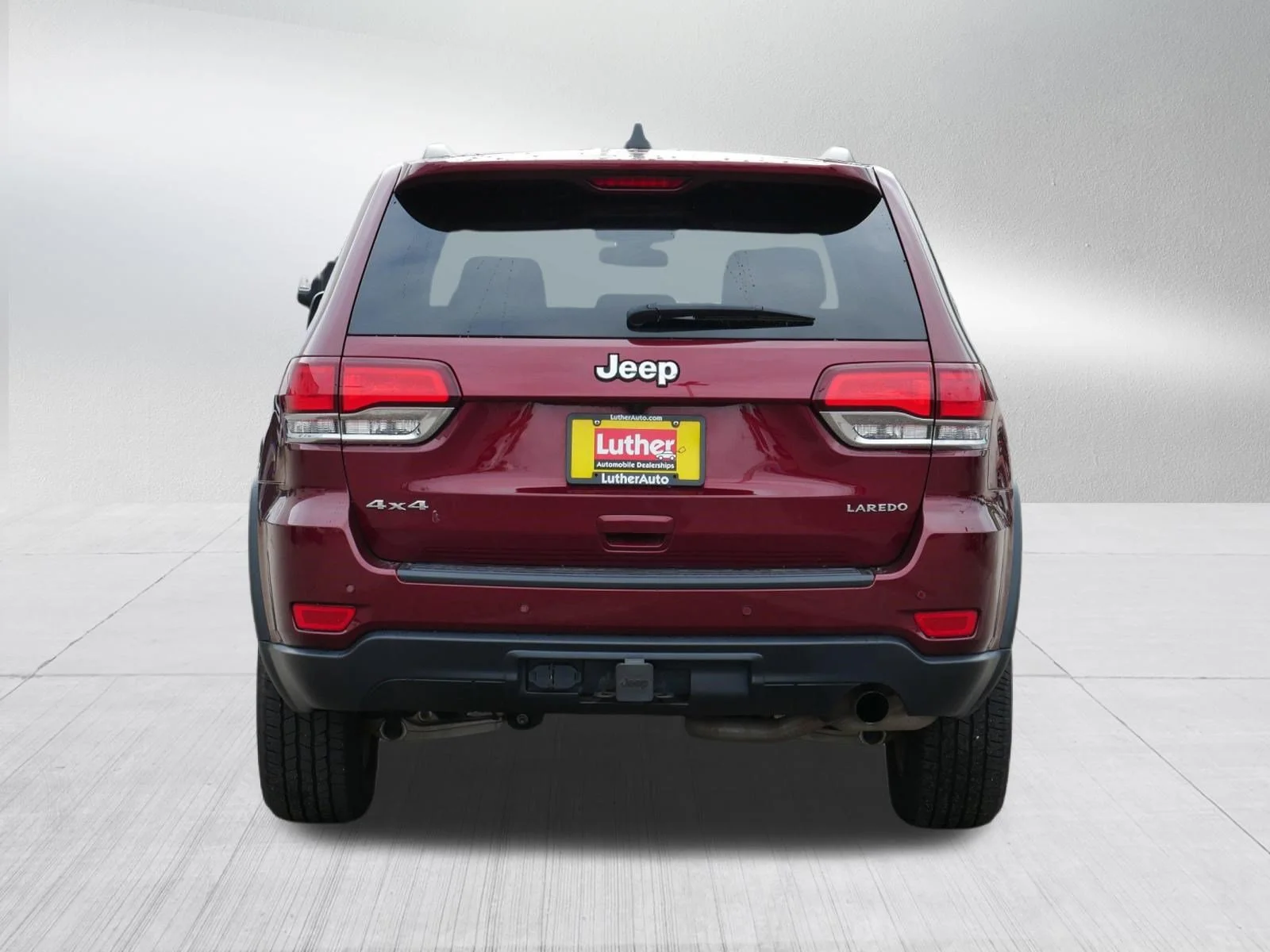 Used 2021 Velvet Red Pearlcoat Jeep Laredo E image 6