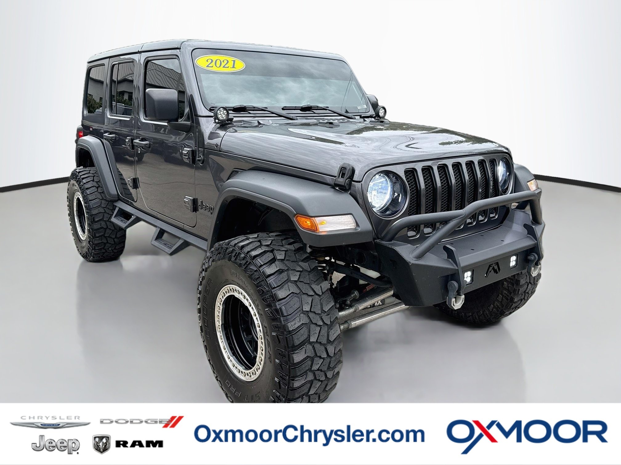 Used 2021 Granite Crystal Metallic Clearcoat Jeep Unlimited Sport Altitude image 1