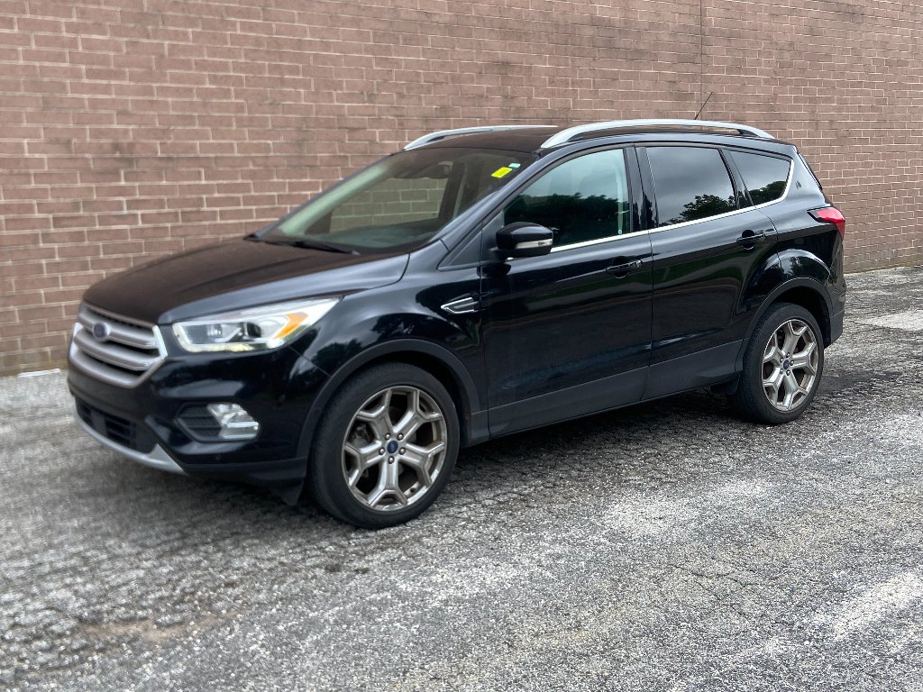 Used 2019 Agate Black Metallic Ford Titanium image 1